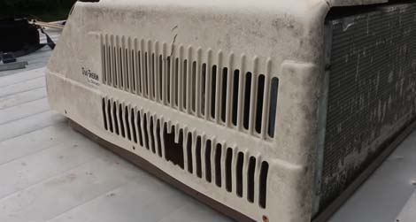Remove Dirt and Debris from the AC Unit's Top