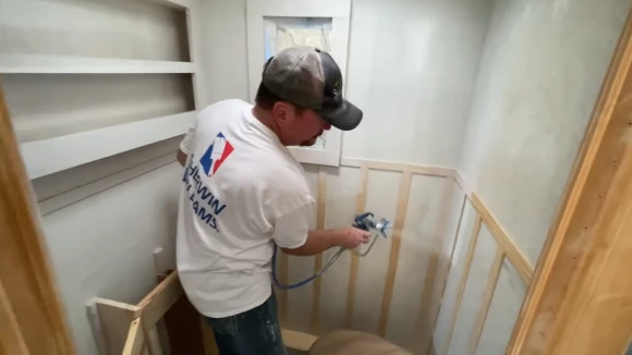 Applying Paint in Even Coats to Cover Wallpaper