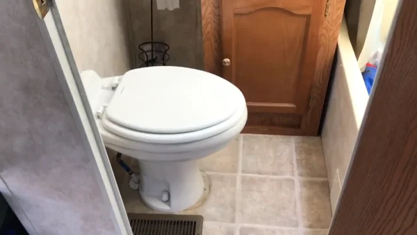 Can I lower my RV toilet if it's raised up