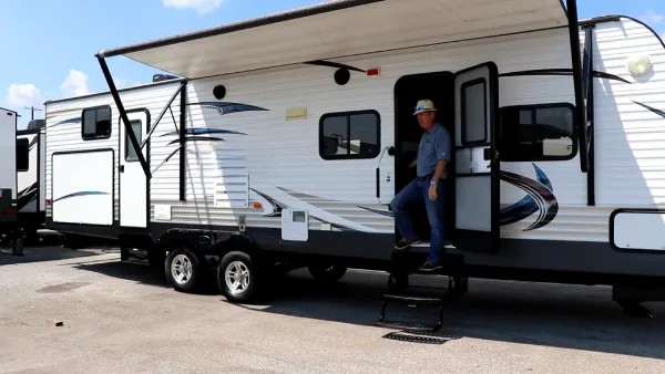 What RV awning materials resist sun damage