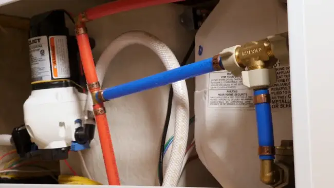 How does a water heater bypass valve work