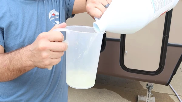 How often should I sanitize my RV water tank with hydrogen peroxide