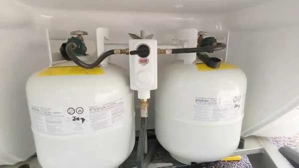 Who is responsible for getting propane tanks recertified for RVs